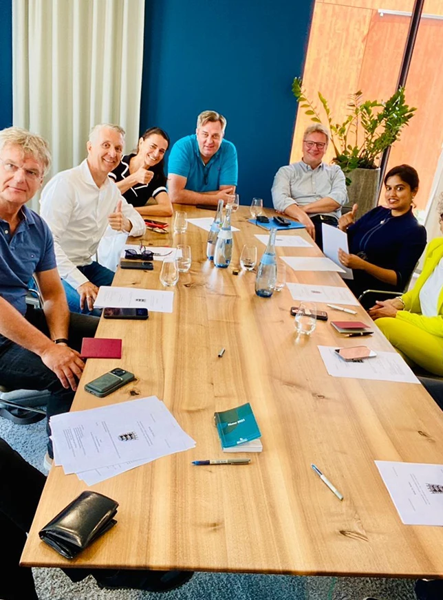 The Zefyron team with investors at the table